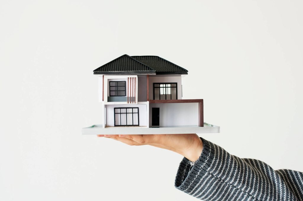 hand-presenting-model-house-home-loan-campaign-1.jpg